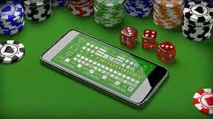 Ikon mugentogel di layar utama iOS menampilkan logo merek dengan latar belakang burgundy dan emas